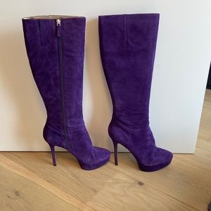 Knee high purple suede boots. A couple years old. Wore them once.